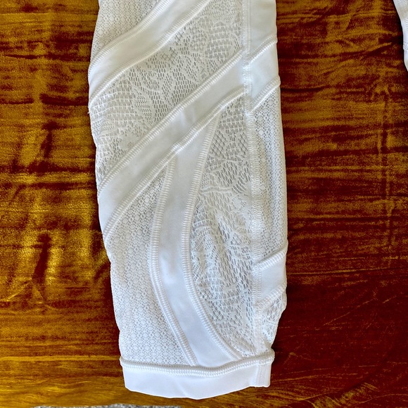 Lululemon white leggings with lace detail on the legs. Worn  1x, small for me. - Picture 2 of 3
